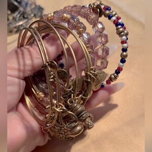 Alex & Ani brassy colored bracelets